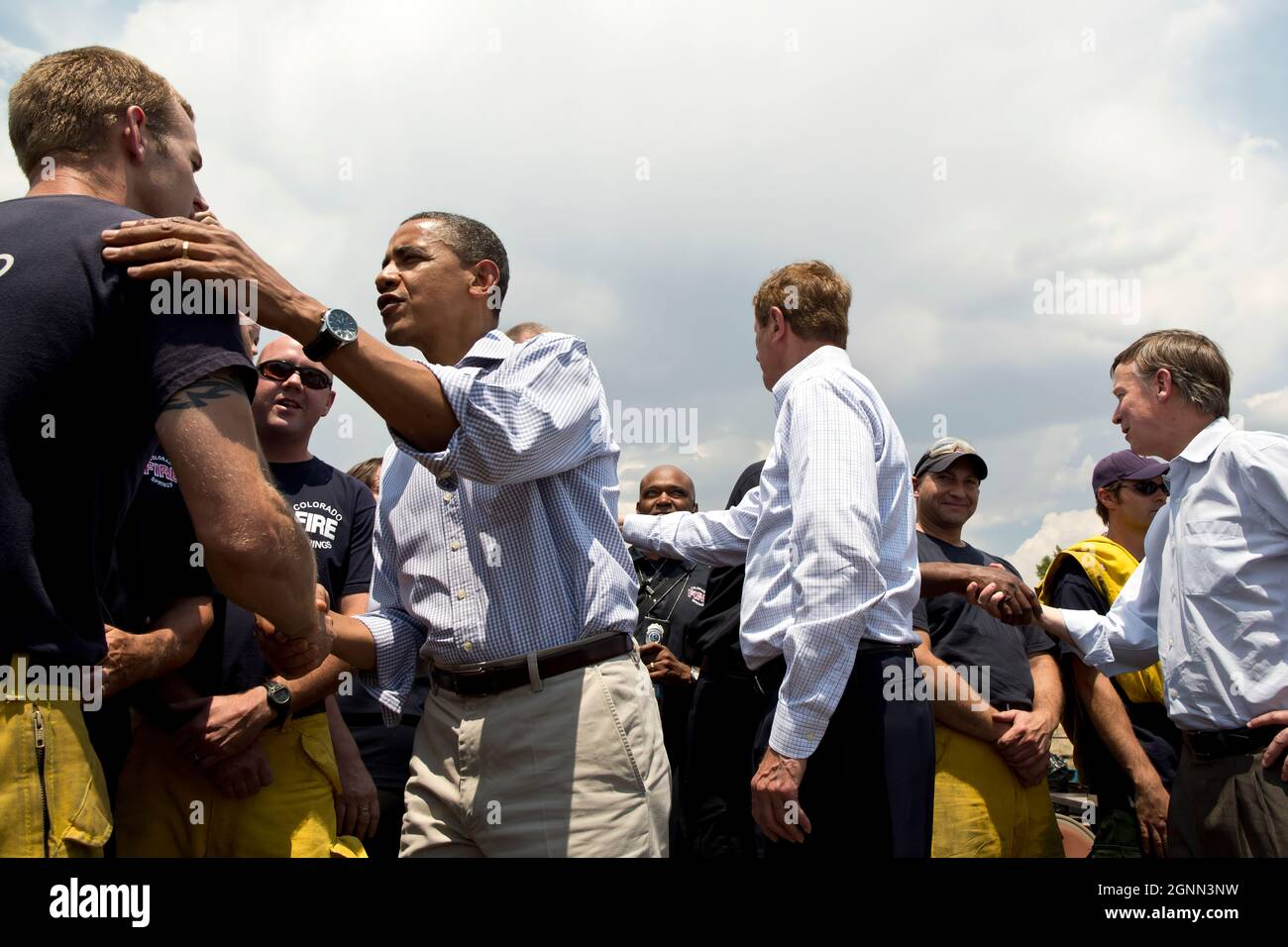 President Barack Obama greets personnel at Fire Station No. 9 in Colorado Springs, Colo., June 29, 2012. (Official White House Photo by Pete Souza) This official White House photograph is being made available only for publication by news organizations and/or for personal use printing by the subject(s) of the photograph. The photograph may not be manipulated in any way and may not be used in commercial or political materials, advertisements, emails, products, promotions that in any way suggests approval or endorsement of the President, the First Family, or the White House. Stock Photo