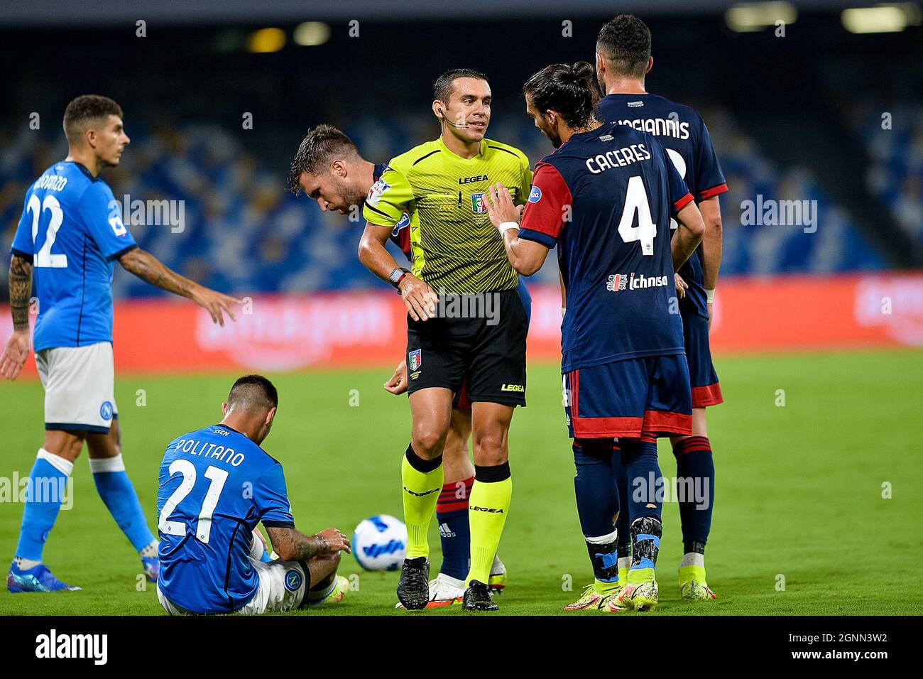 NAPLES, ITALY - SEPTEMBER 26: Referee Marco Piccinini and Martin Caceres of Cagliari Calcio during the Serie A match between SSC Napoli and Cagliari Calcio at Stadio Diego Armando Maradona on September 26, 2021 in Naples, Italy (Photo by Ciro Santangelo/Orange Pictures) Stock Photo