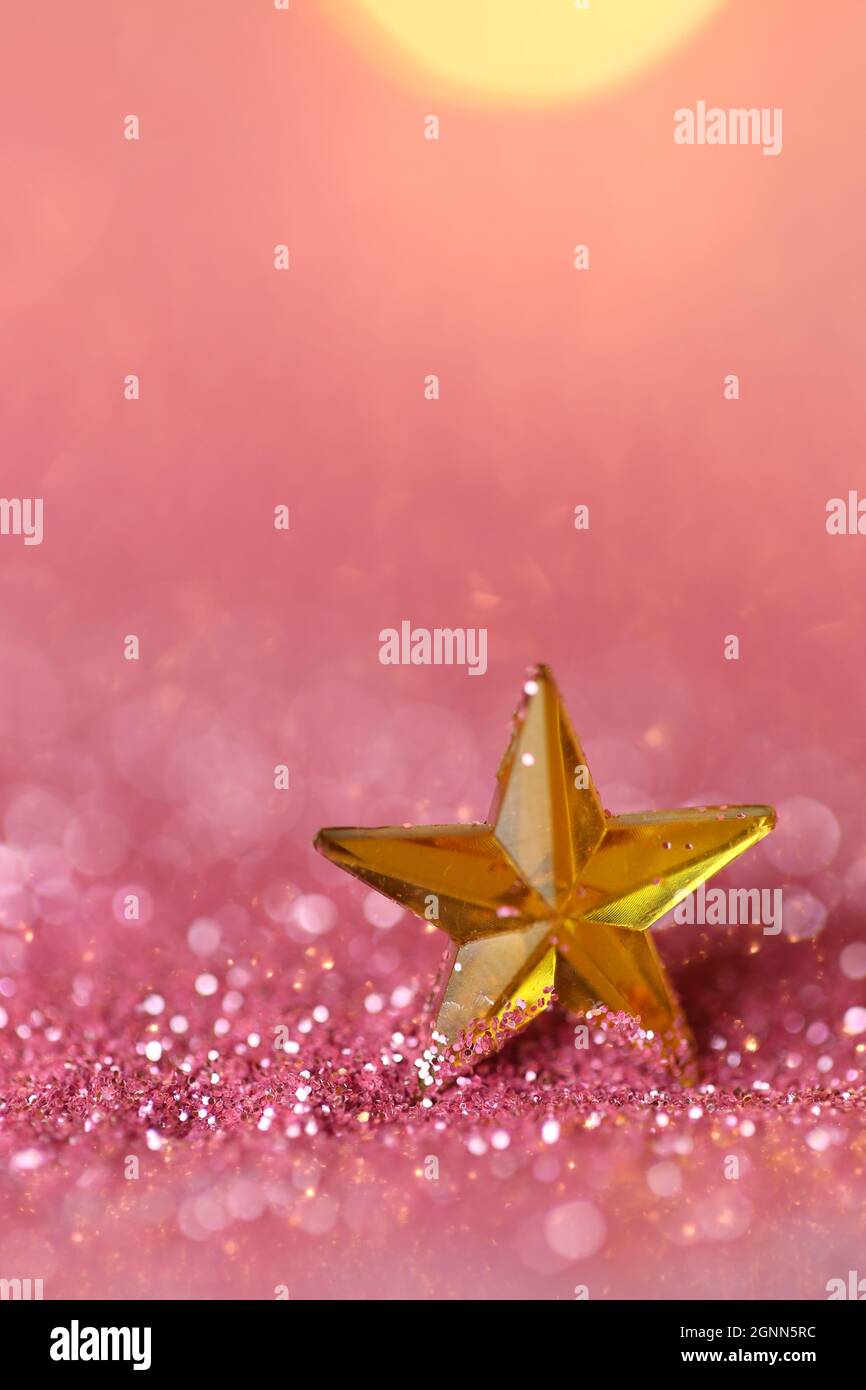 Wallpaper shining glitter.New Year and Christmas background. gold star in  pink glitter .Beautiful festive background in rose gold tones.Shining Stock  Photo - Alamy