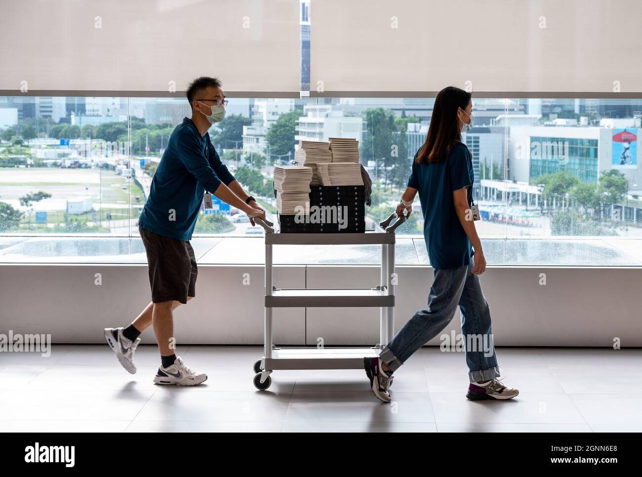 Hong Kong, China. 24th Sep, 2021. Apple workers carry stocks of iphone 13 smartphones to the store on the first weekend after the launch of the new iPhone 13 series smartphones in Hong Kong. (Credit Image: © Budrul Chukrut/SOPA Images via ZUMA Press Wire) Stock Photo