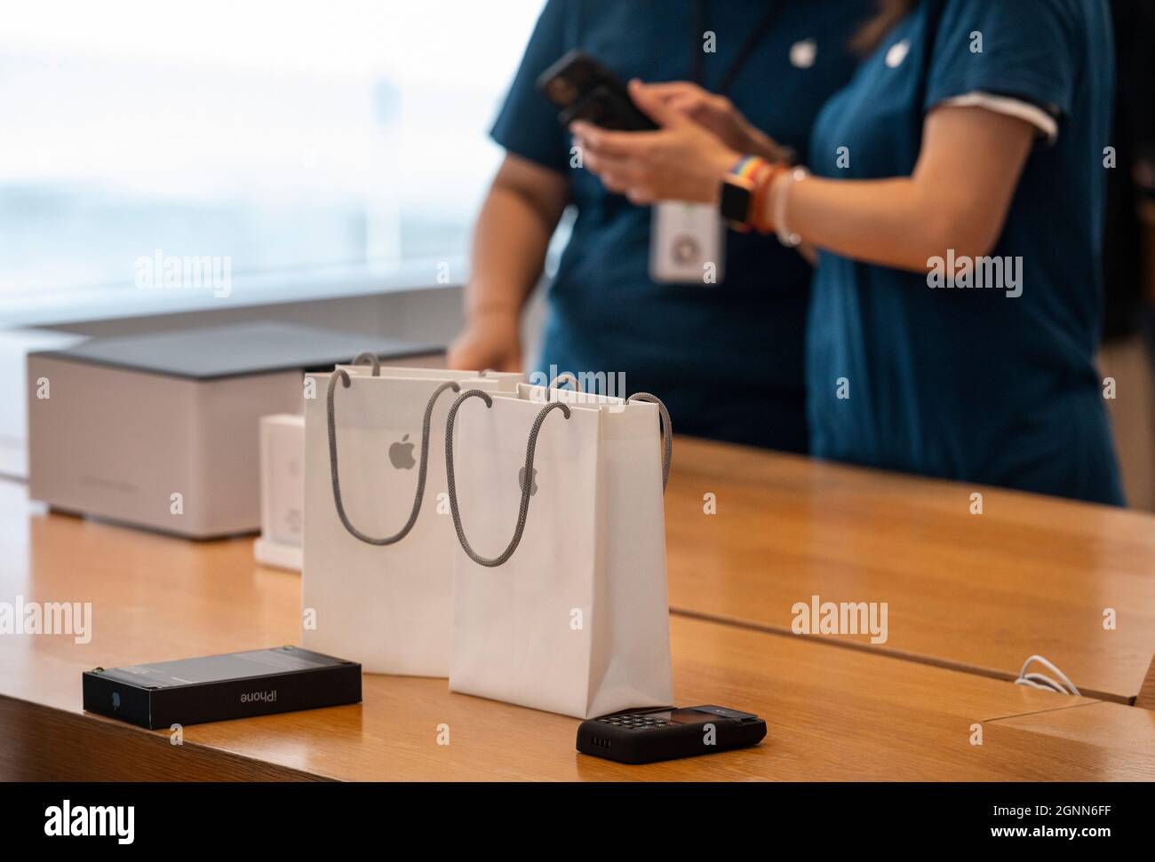 Hong Kong, China. 24th Sep, 2021. Shoppers are seen purchasing Apple brand products at at an Apple store on the first weekend after the launch of the new iPhone 13 series smartphones in Hong Kong. (Credit Image: © Budrul Chukrut/SOPA Images via ZUMA Press Wire) Stock Photo