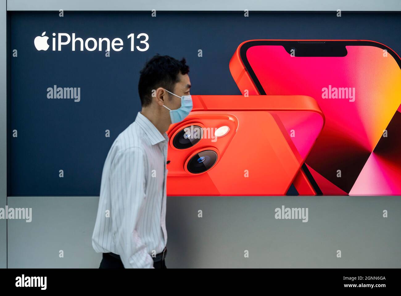 Hong Kong, China. 24th Sep, 2021. A pedestrian walks past the Apple store on the first weekend after the launch of the new iPhone 13 series smartphones in Hong Kong. (Credit Image: © Budrul Chukrut/SOPA Images via ZUMA Press Wire) Stock Photo