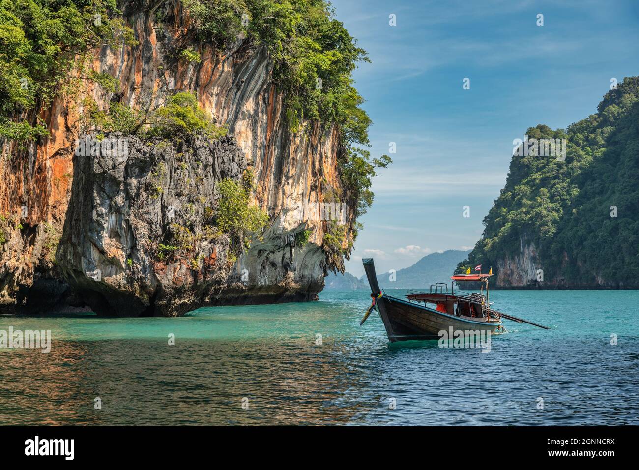 Tropical islands view with long tail boat and ocean blue sea water at Koh Lao Lading, Krabi Thailand nature landscape Stock Photo