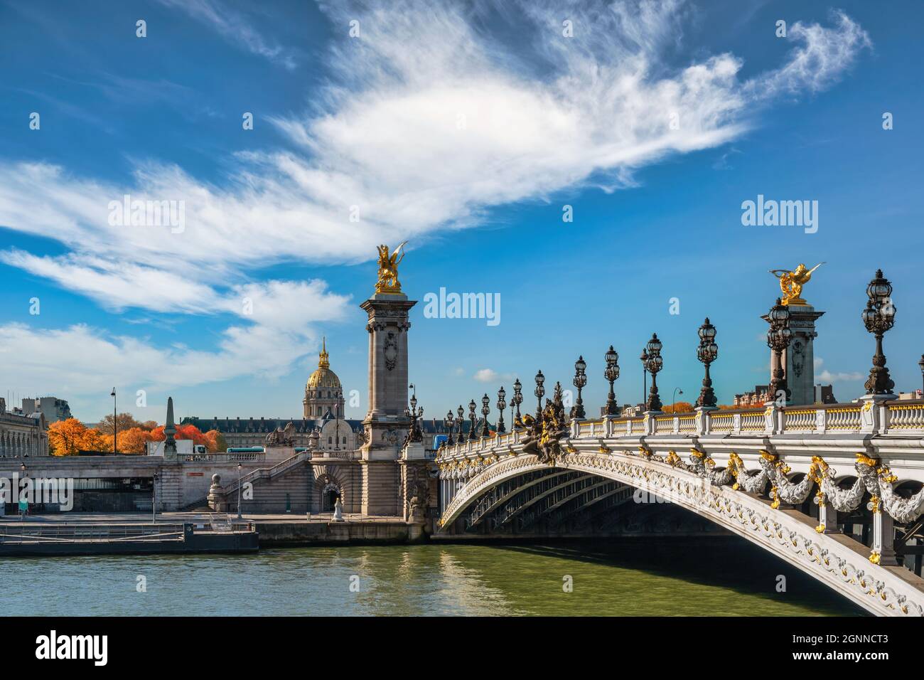 Paris France, city skyline at Seine River Pont Alexandre III bridge and Esplanade des Invalides with autumn foliage season Stock Photo