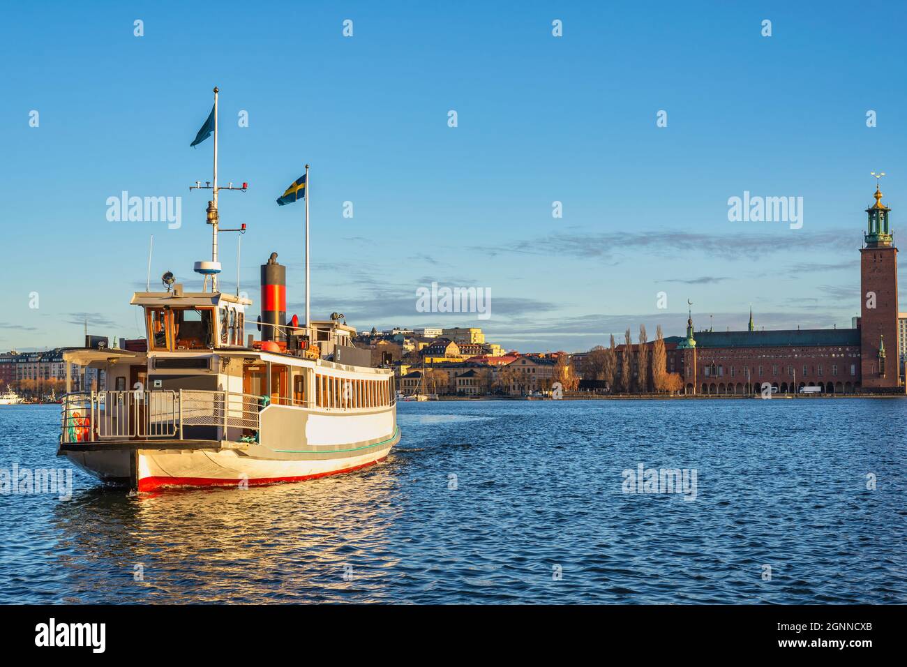 Stockholm Sweden, city skyline at Stockholm City Hall and Metro ferry Stock Photo