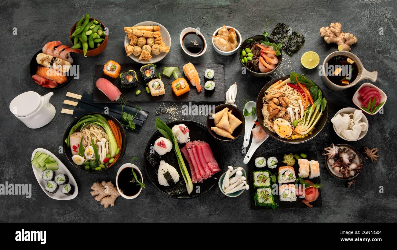 Japanese dishes and snacks on gray background. Traditional food concept. Top view, flat lay Stock Photo