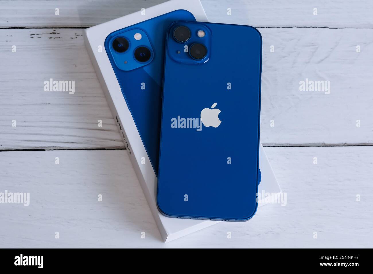 iPhone 13 in blue Stock Photo Alamy
