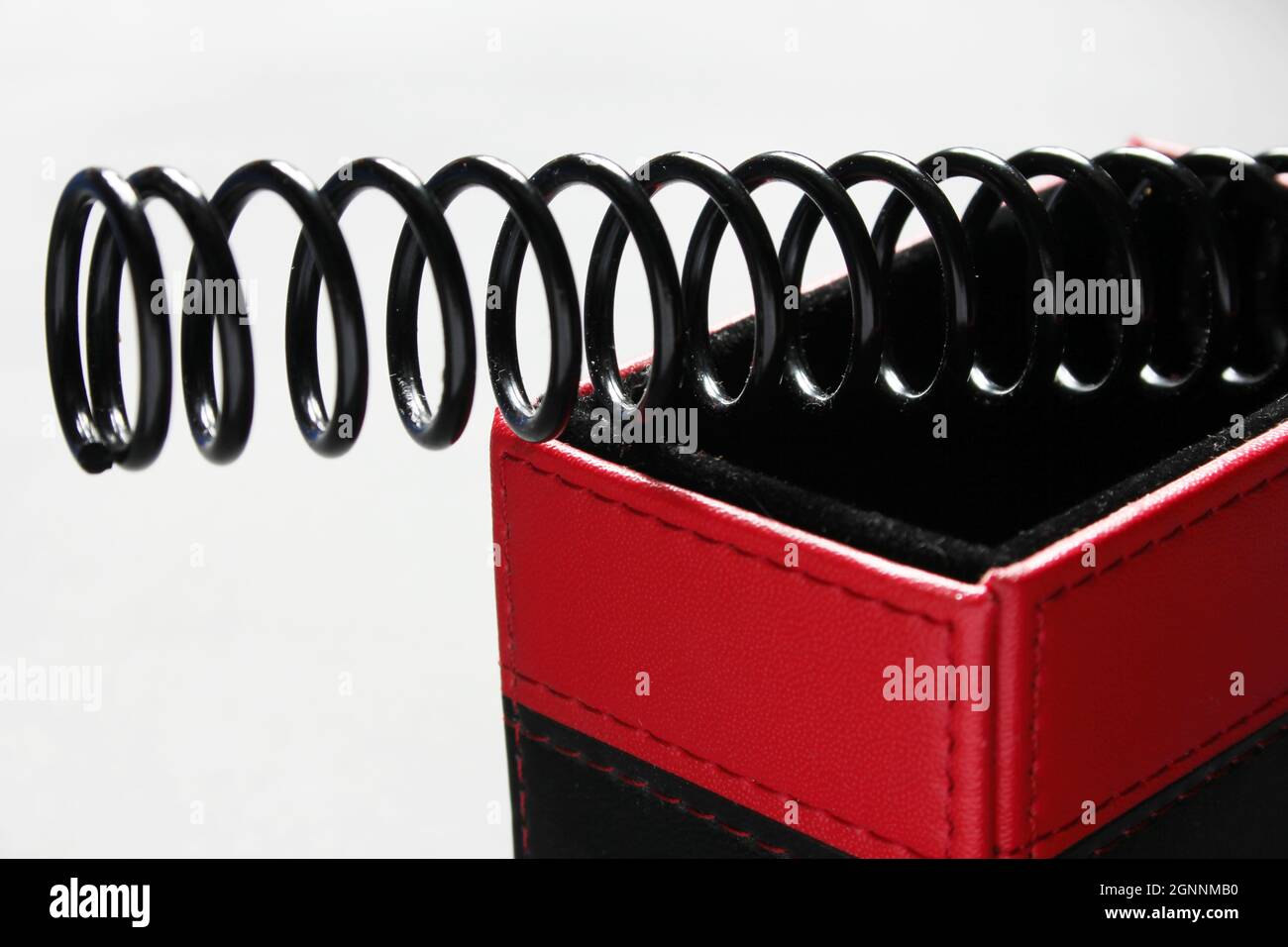 Metal spring stretching hi-res stock photography and images - Alamy