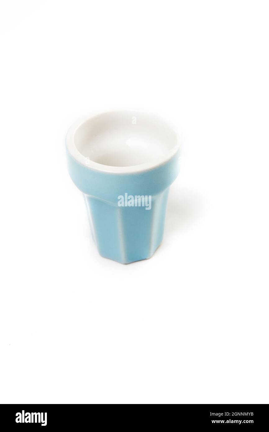 Blue glass cup isolated on white background Stock Photo