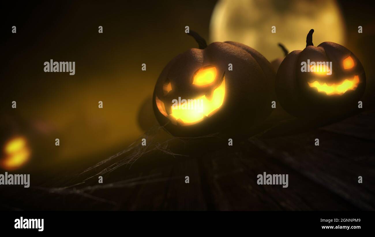 Scary carved pumpkins face glowing light with moon in halloween night ...