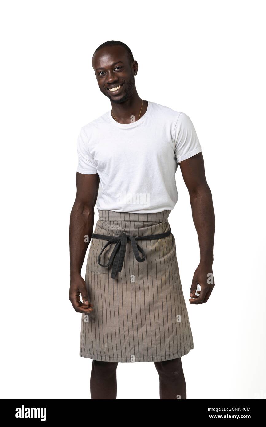 African Boy With Apron Poses Three quarter On White Background In Photo african-boy-with-apron-poses-three-quarter-on-white-background-in-photo