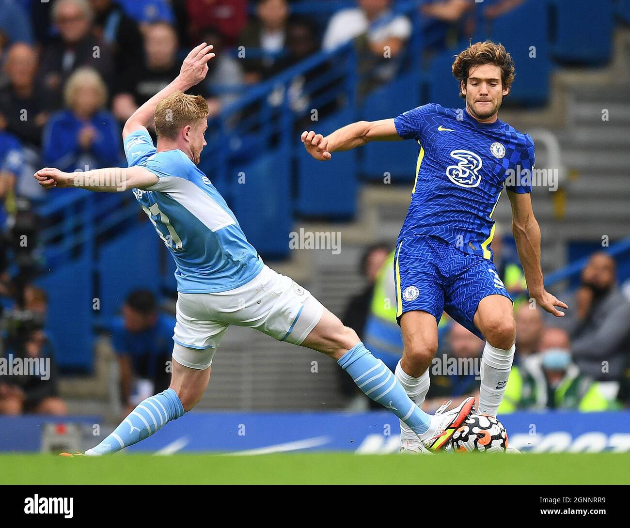 London,UK. 25 September 2021 - Chelsea v Manchester City  - The Premier League - Stamford Bridge  Marcus Alonso and Kevin De Bruyne during the Premier League match at Stamford Bridge.  Picture Credit : © Mark Pain / Alamy Live News Stock Photo