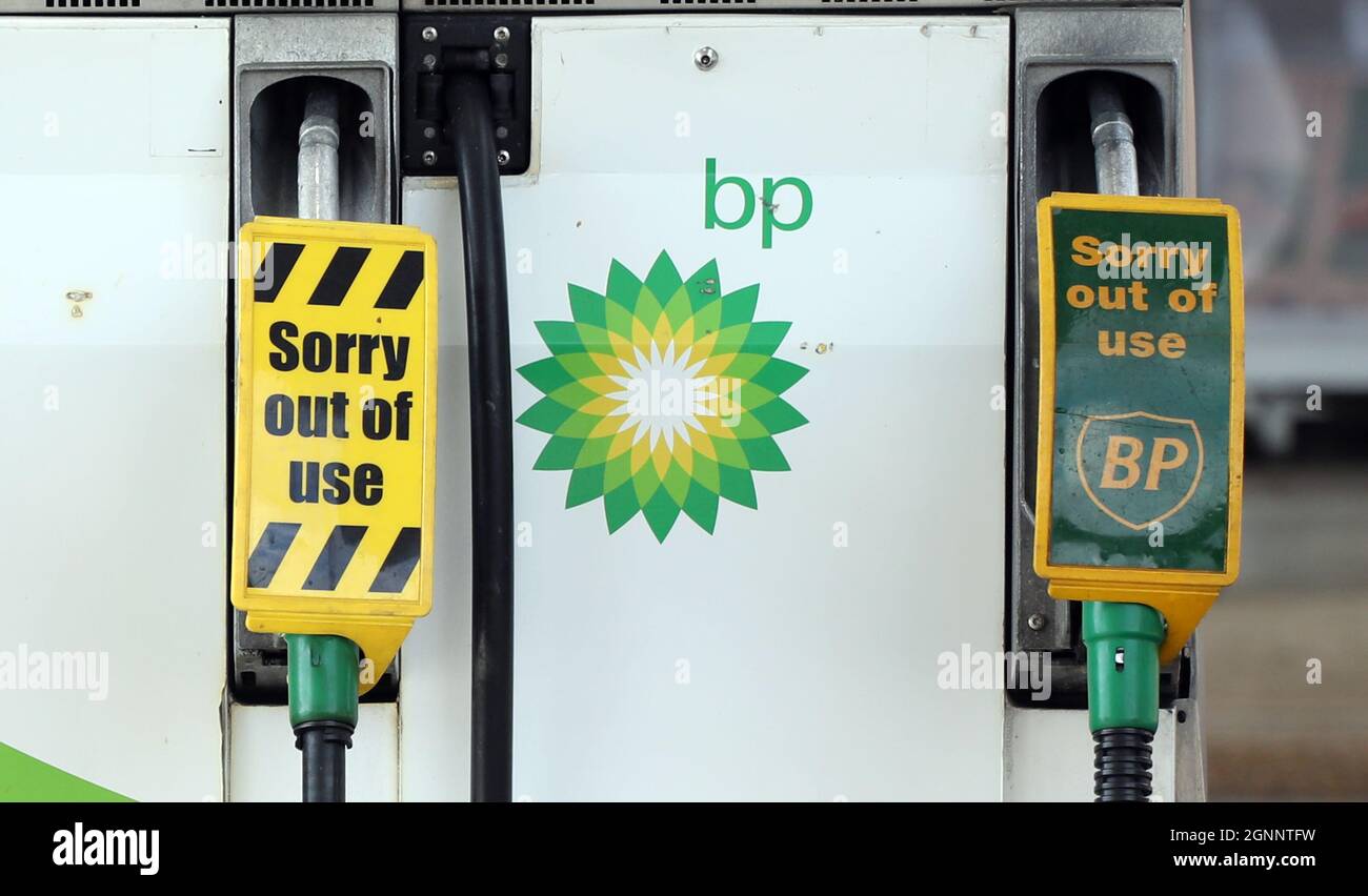 Peterborough, UK. 25th Sep, 2021. Sorry out of use signs on the pump at the BP service station in Yaxley, near Peterborough, Cambridgeshire, where all of the petrol and diesel has been used, because some people have started to panic buy after news of a fuel supply shortage got out of hand. Credit: Paul Marriott/Alamy Live News Stock Photo