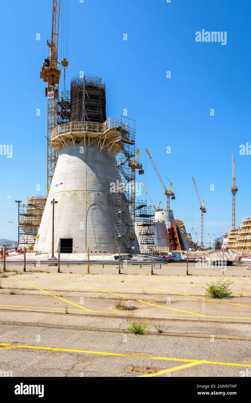 Construction site of offshore wind turbine foundations in Le Havre, France. Stock Photo