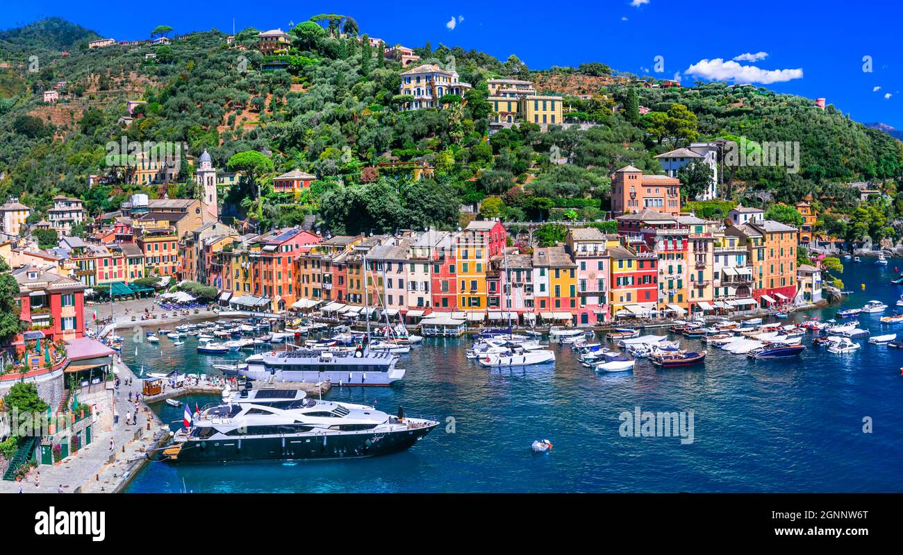 most beautiful coastal towns of Italy - luxury Portofino in Liguria, Panoramic view with colorful houses and sailing boats Stock Photo