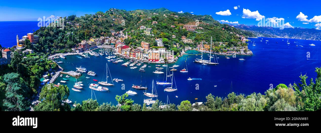 most beautiful coastal towns of Italy - luxury Portofino in Liguria, Panoramic view with colorful houses and sailing boats Stock Photo