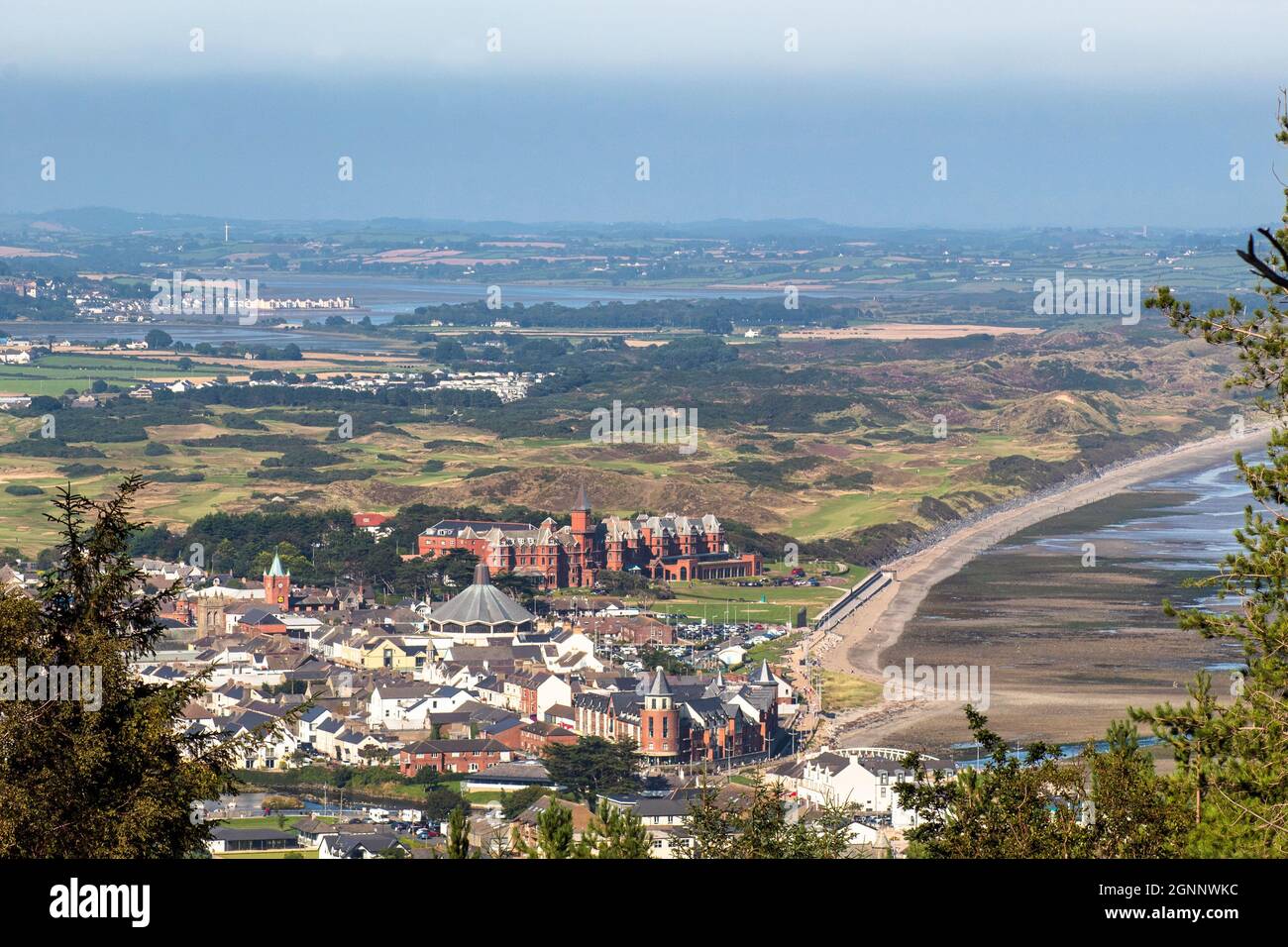 View From The Mourne Mountains Of Slieve Donard Hotel, Royal County Down Golf Course And Dundrum Bay. Stock Photo