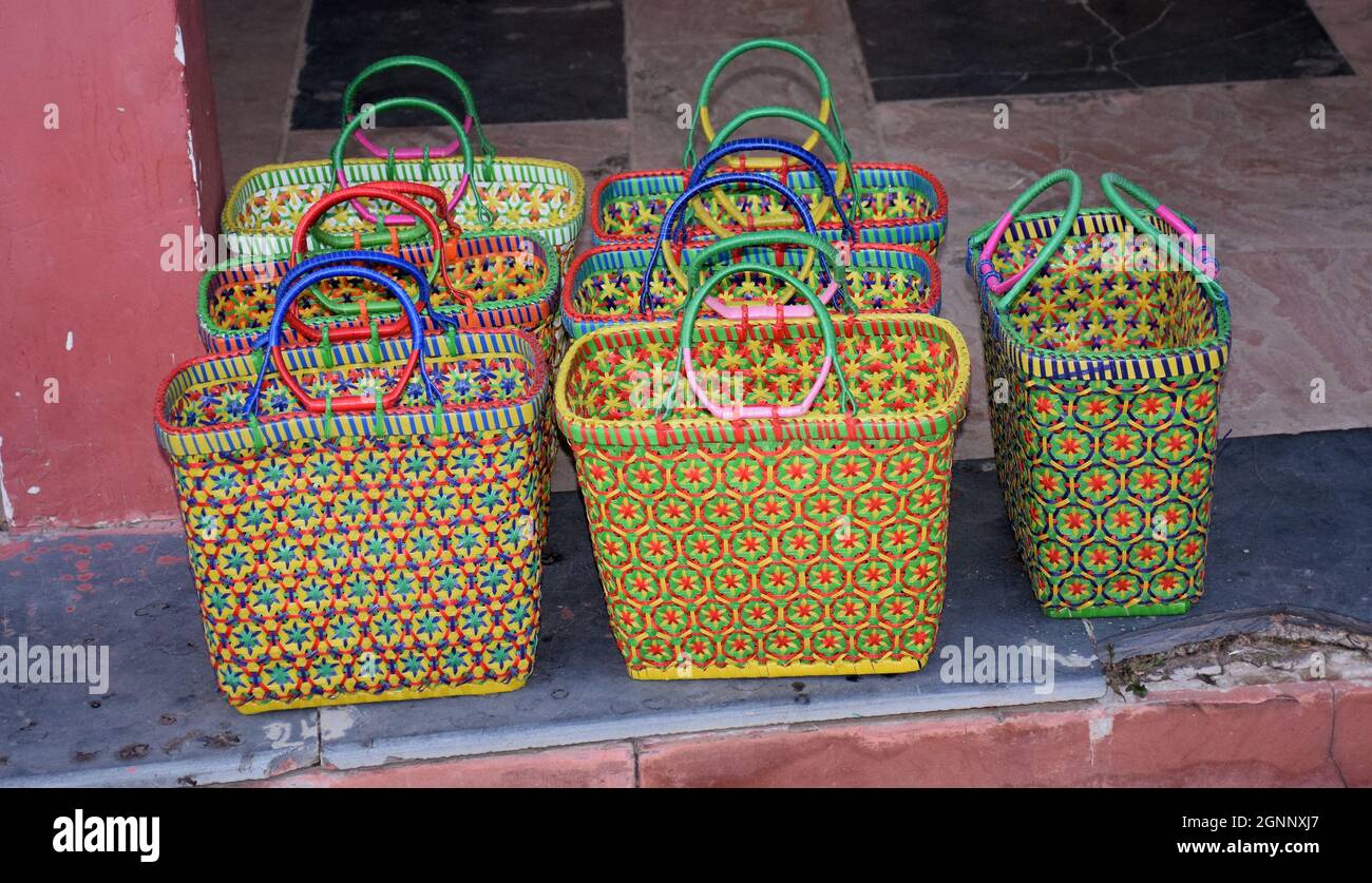 Hand woven plastic wire basket bags for shopping Stock Photo - Alamy