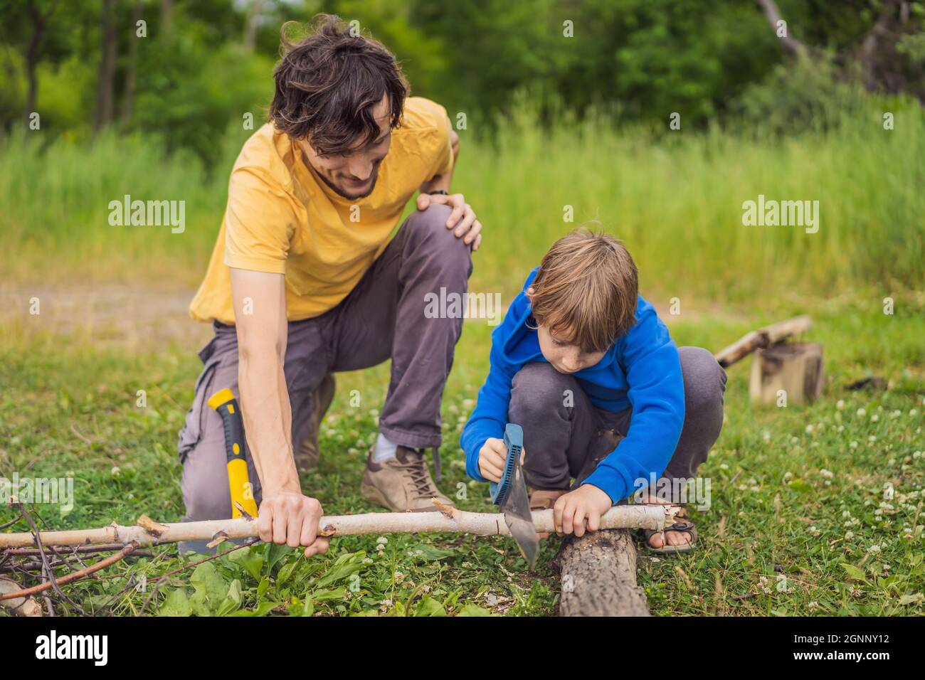 Father and son working with tools outdoor Stock Photo