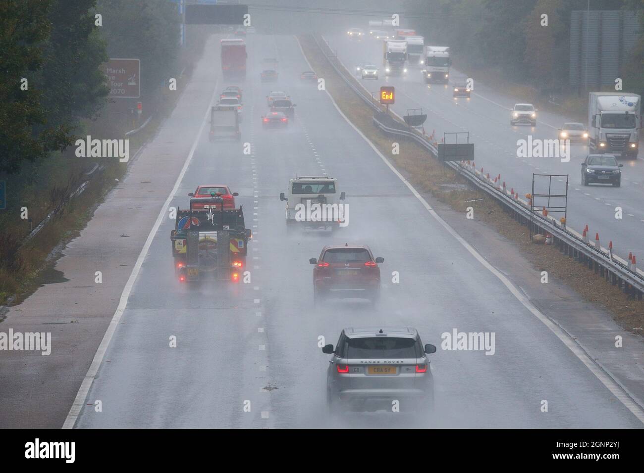 Ashford, Kent, UK. 27 Sep, 2021. UK Weather: A band of heavy rain sweeps across the country with windy weather seen here on the M20 motorway heading South towards Dover. Photo Credit: Paul Lawrenson /Alamy Live News Stock Photo