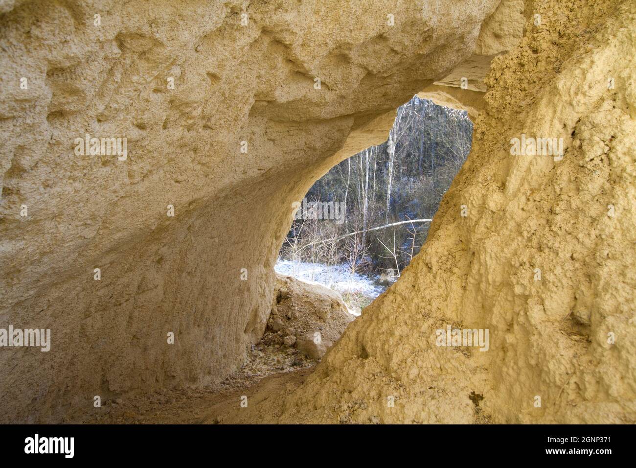 Remains of kaolin underground mining near Červený Újezd, Czech republic. A look outside from a semi-collapsed adit on an edge of a quarry. Stock Photo