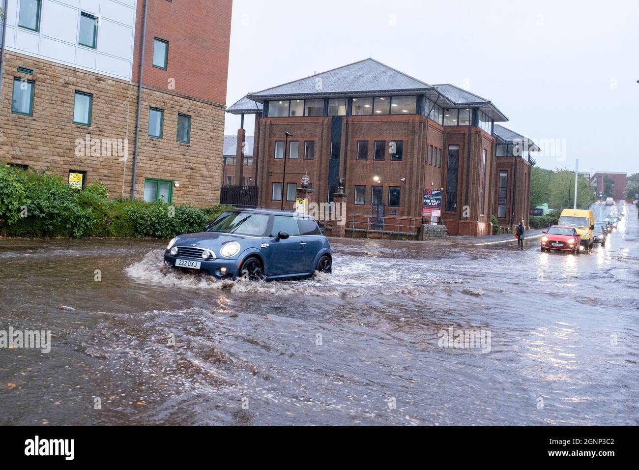 Sheffield, UK- 27th September 2021 -Motorists drive through floodwater during the rush hour in Sheffield as wet and windy weather crosses the country: Credit: Mark Harvey/Alamy Live News Stock Photo