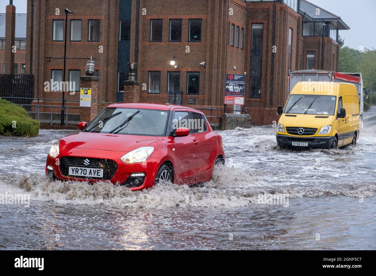 Sheffield, UK- 27th September 2021 -Motorists drive through floodwater during the rush hour in Sheffield as wet and windy weather crosses the country: Credit: Mark Harvey/Alamy Live News Stock Photo