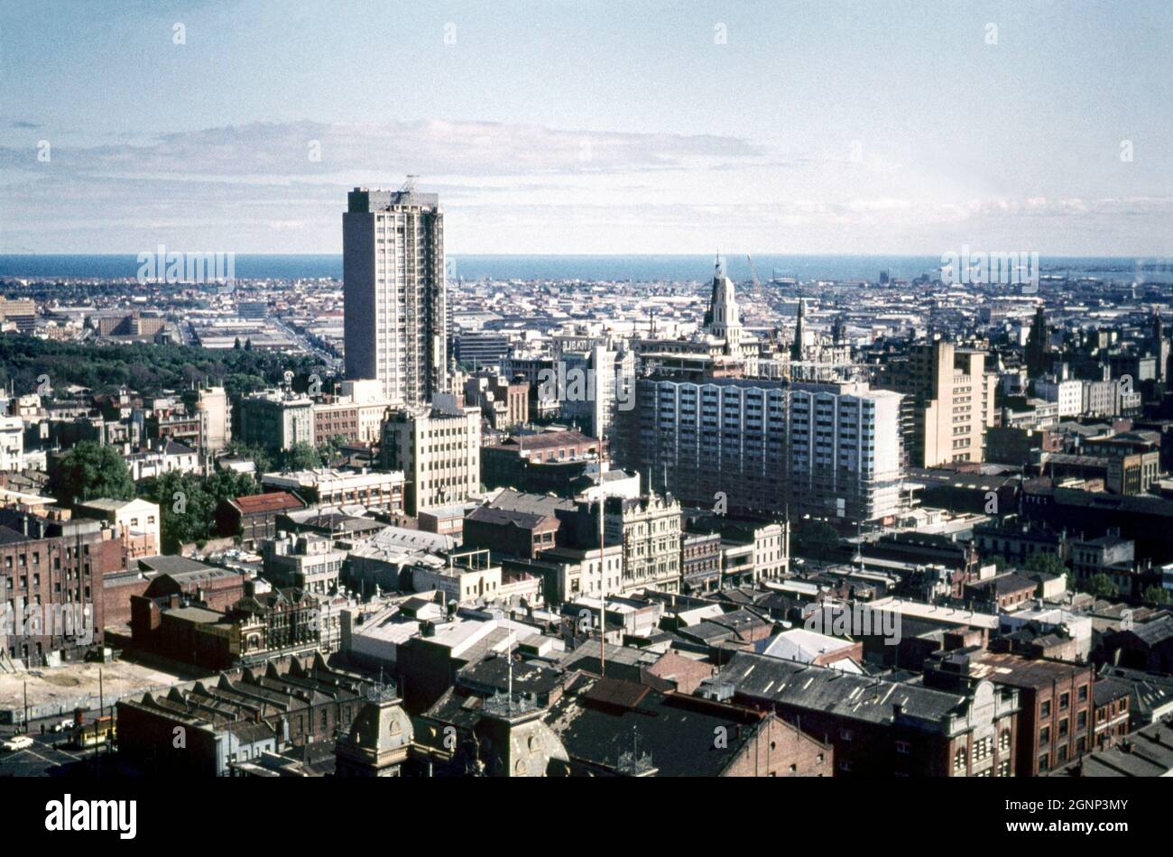 An aerial view looking south from the central business district (CBD) towards Port Phillip Bay, Melbourne, Victoria, Australia in 1961. This image is from an amateur photographer’s 35mm colour transparency – a vintage 1960s photograph. Stock Photo
