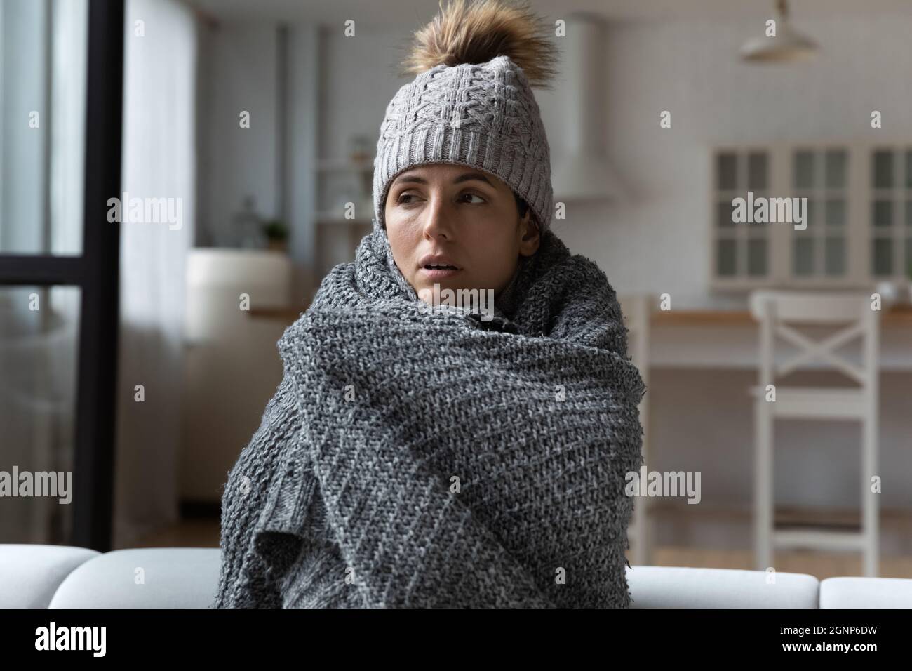 Unhealthy woman feel cold sick at home Stock Photo