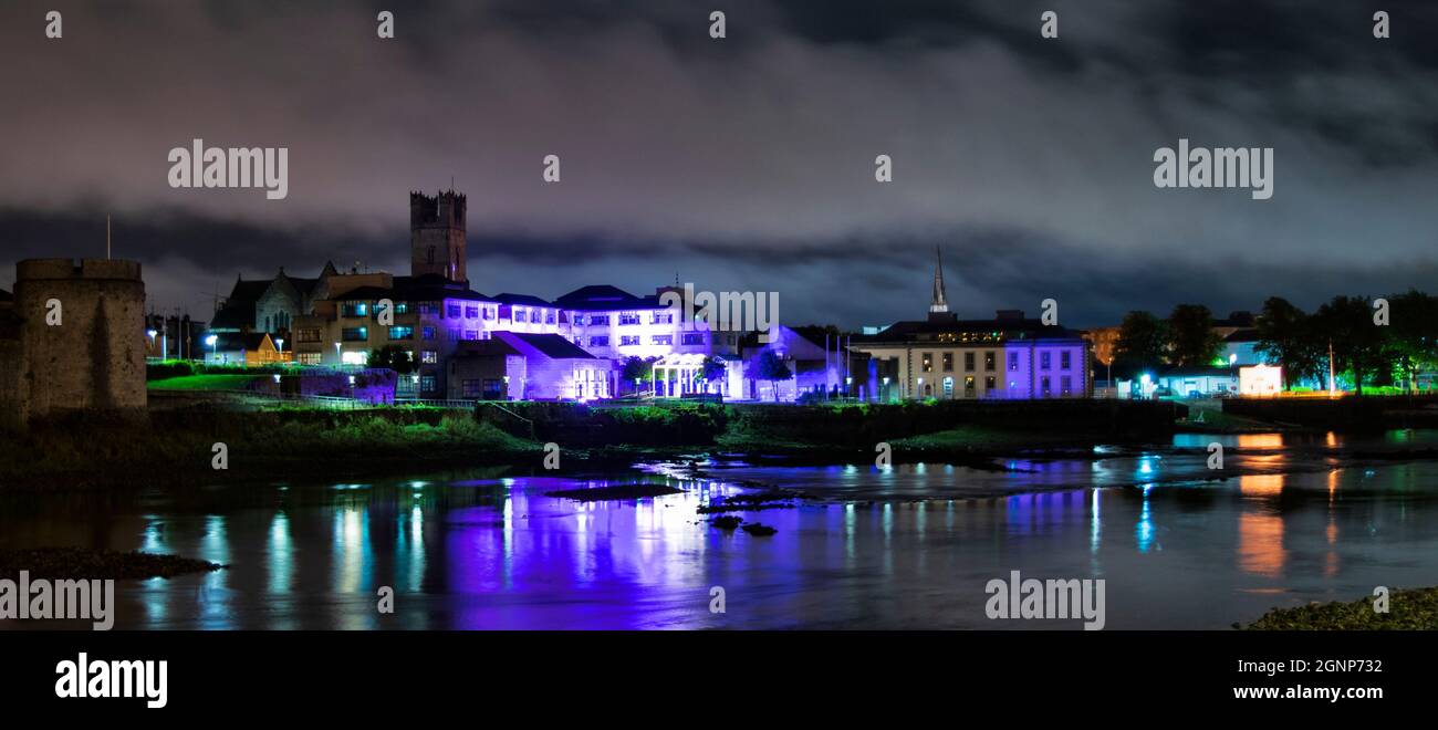 Limerick at night, the River Shannon illuminated by colors, King’s