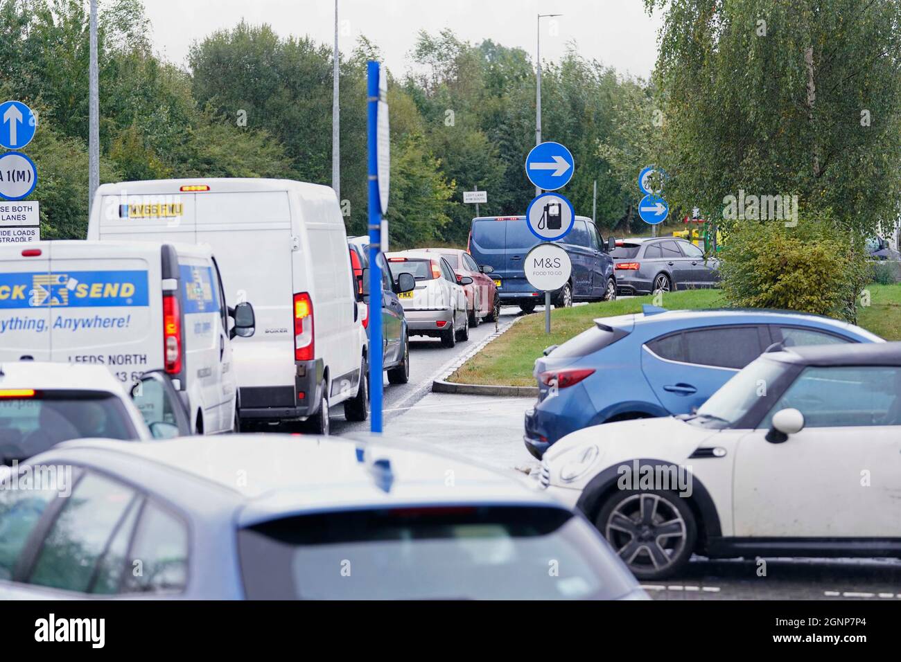 Cars queuing at a BP service station in Wetherby near Leeds. Picture