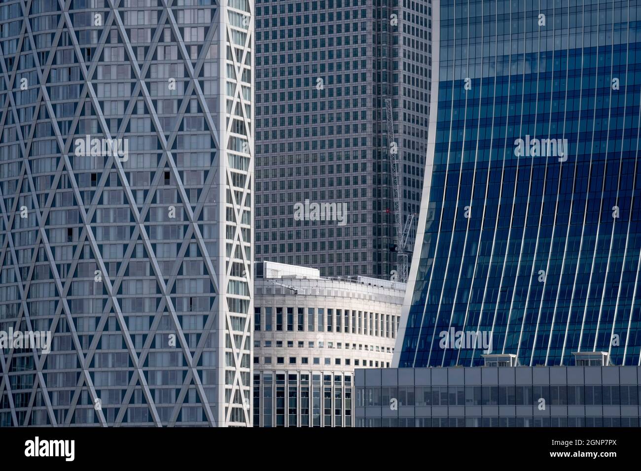 Corporate high-rise offices at Canary Wharf in London Docklands, on 16th September 2021, in London, England. Canary Wharf was once a thriving Victorian cargo dock but after Thames shipping declined from the 1960s, its derelict areas were redeveloped in the 19080 by Margaret Thatcher's Docklands Development Corporation created one of the UK’s main financial centres, now home to the European Headquarters of numerous major banks including Barclays, Credit Suisse and HSBC. Stock Photo