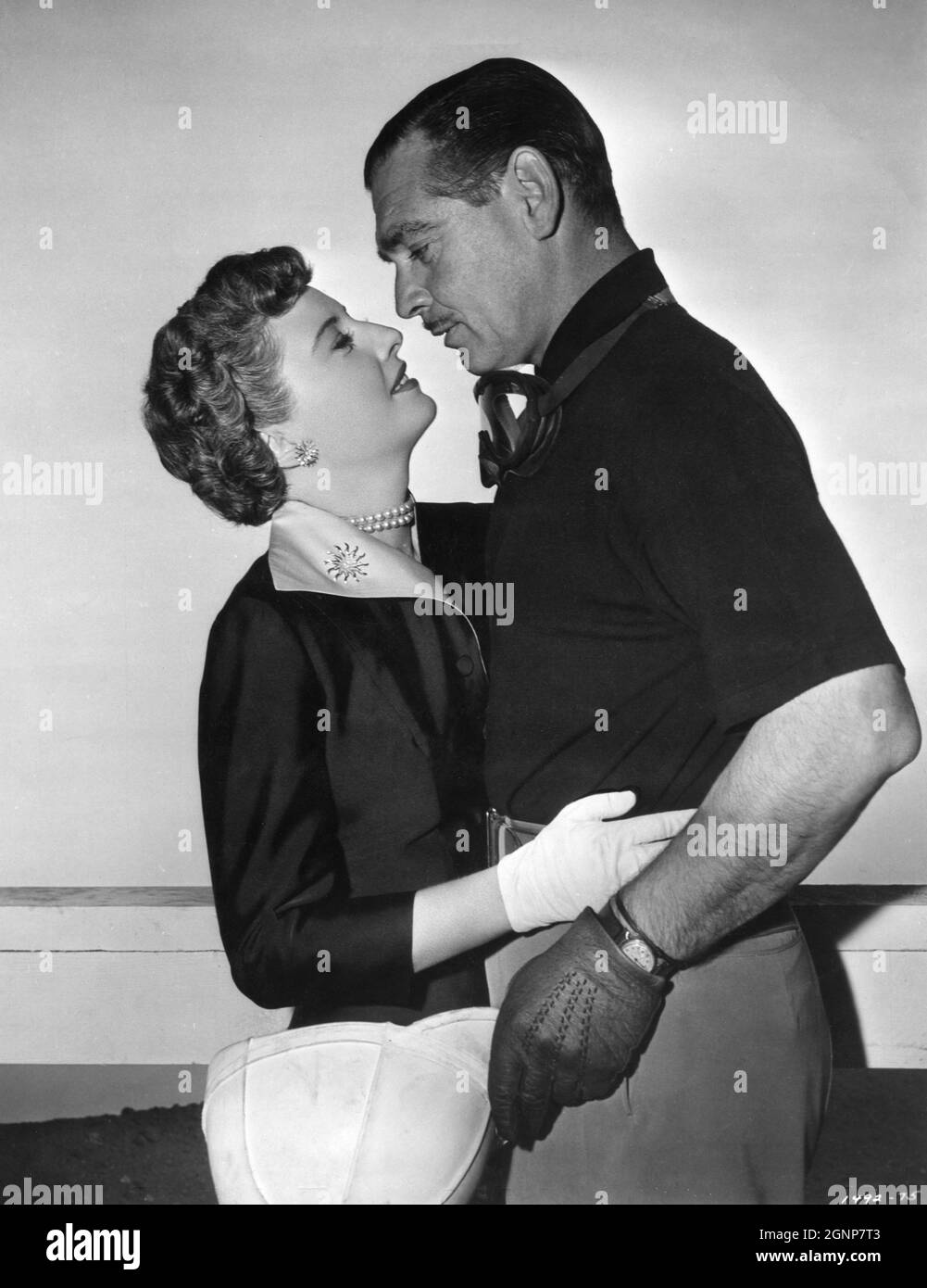 BARBARA STANWYCK and CLARK GABLE in TO PLEASE A LADY 1950 director CLARENCE BROWN story / screenplay Barré Lyndon and Marge Decker costume design Helen Rose Metro Goldwyn Mayer Stock Photo