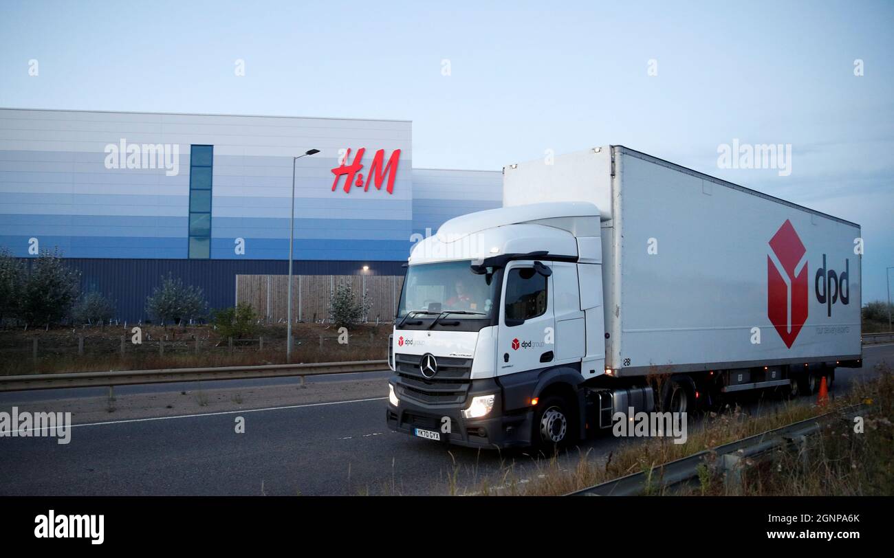 A DPD lorry drives past an H&M warehouse at Magna Park in Milton Keynes,  Britain, September 26, 2021. Picture taken September 26, 2021.  REUTERS/Andrew Boyers Stock Photo - Alamy