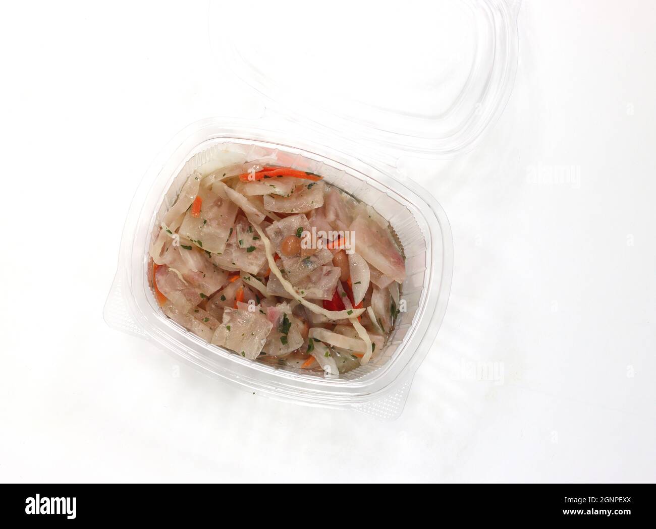 Top view of a transparent container with seasoned beef ribs Stock Photo ...