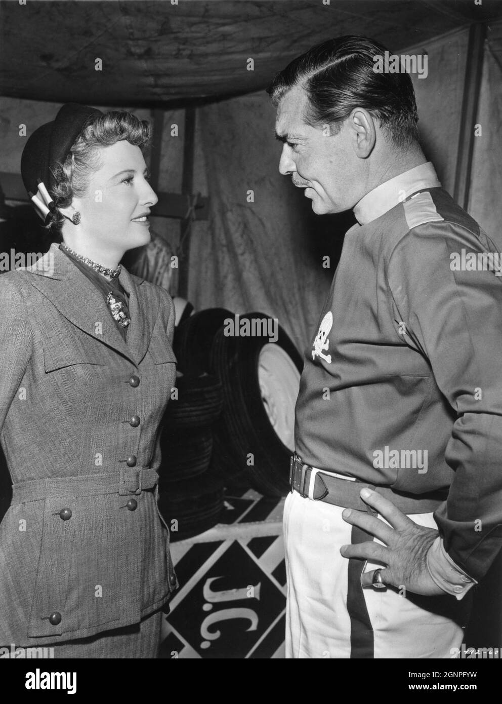 BARBARA STANWYCK and CLARK GABLE in TO PLEASE A LADY 1950 director CLARENCE BROWN story / screenplay Barré Lyndon and Marge Decker costume design Helen Rose Metro Goldwyn Mayer Stock Photo