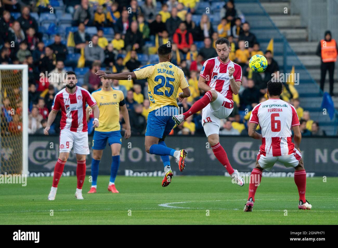 Brondby, Denmark. 26th Sep, 2021. Anis Ben Slimane (25) of Broendby IF and Louka Prip (18) of Aalborg Boldklub seen during the 3F Superliga match between Broendby IF and Aalborg Boldklub at Brondby Stadion. (Photo Credit: Gonzales Photo/Alamy Live News Stock Photo