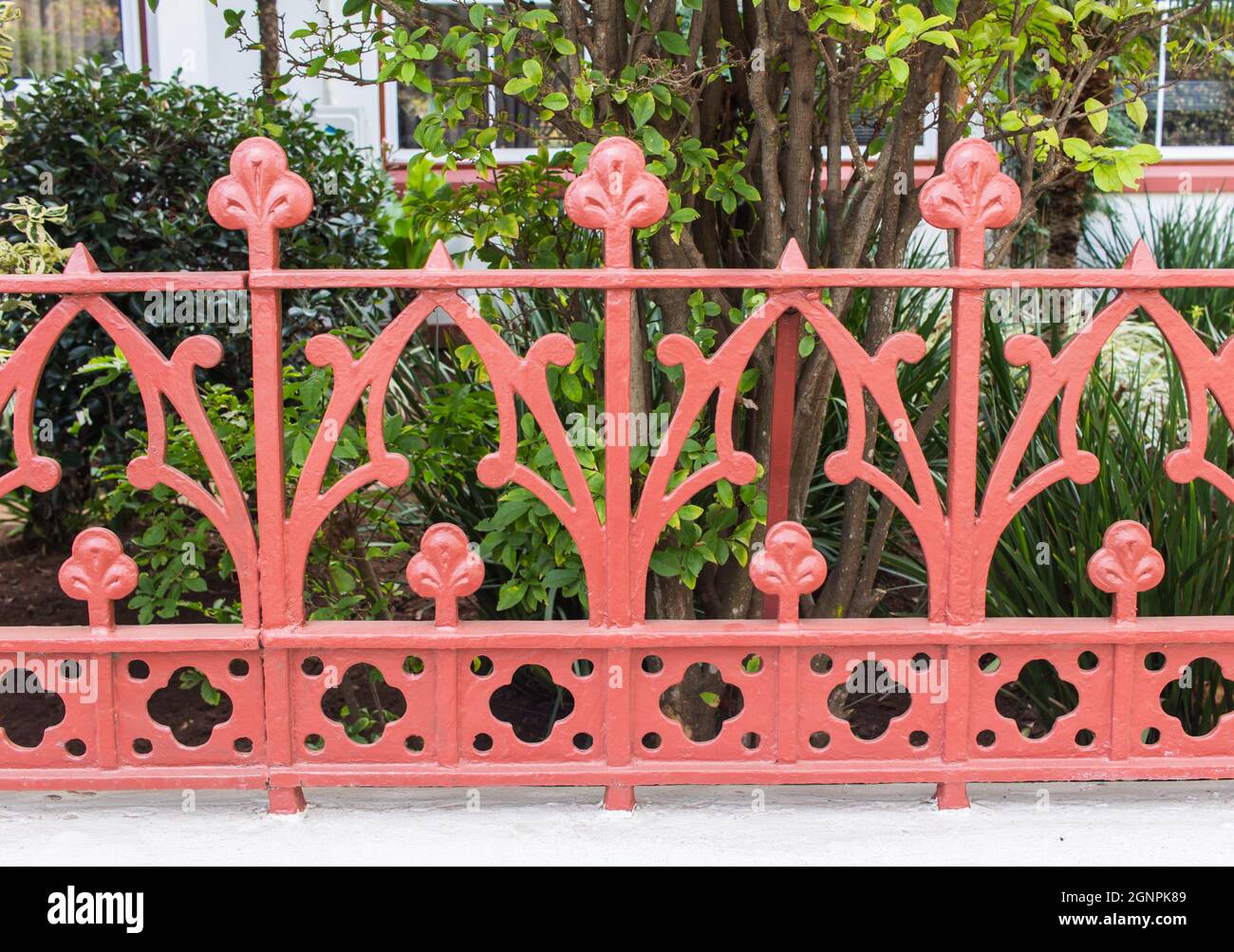 Forge Detail. Part Of A Wrought Iron Fence. Design Pink Iron Gate