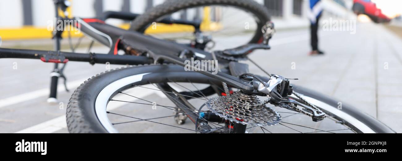 Man falling from bike on road closeup Stock Photo Alamy