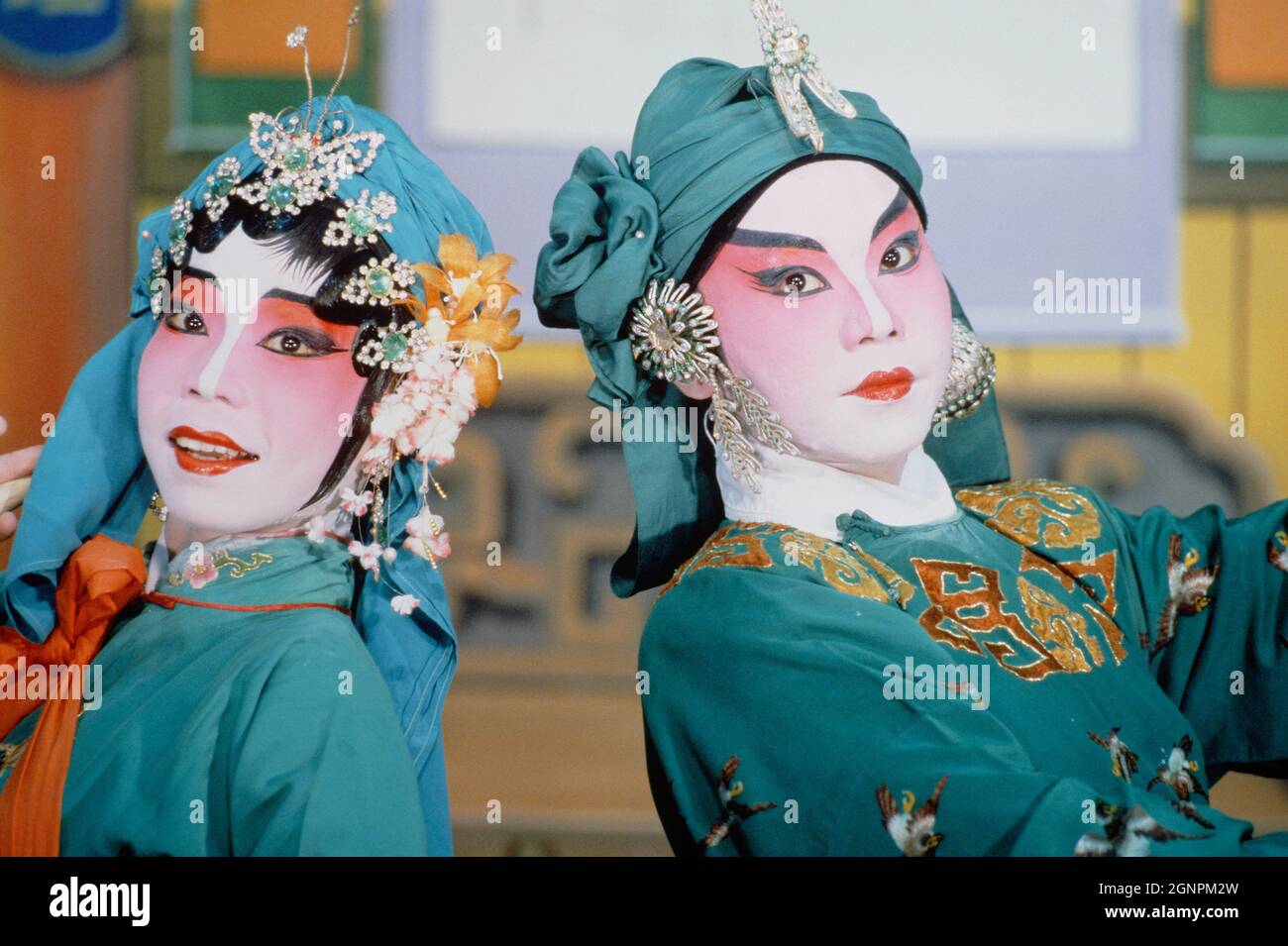 Chinese culture. Man and woman Chinese Opera Performers. Singapore. Stock Photo