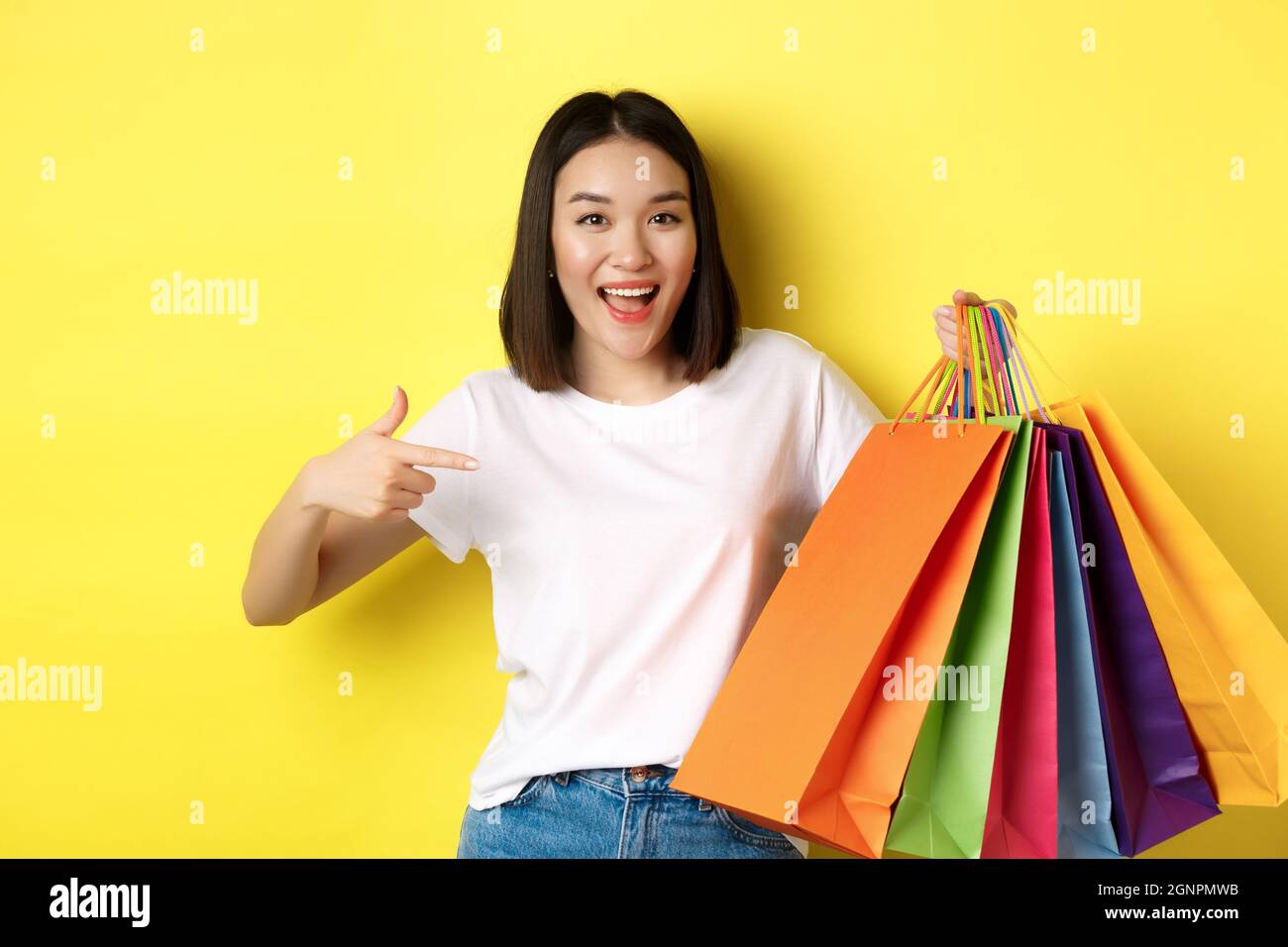 Japanese young woman paper bags hires stock photography and images Alamy