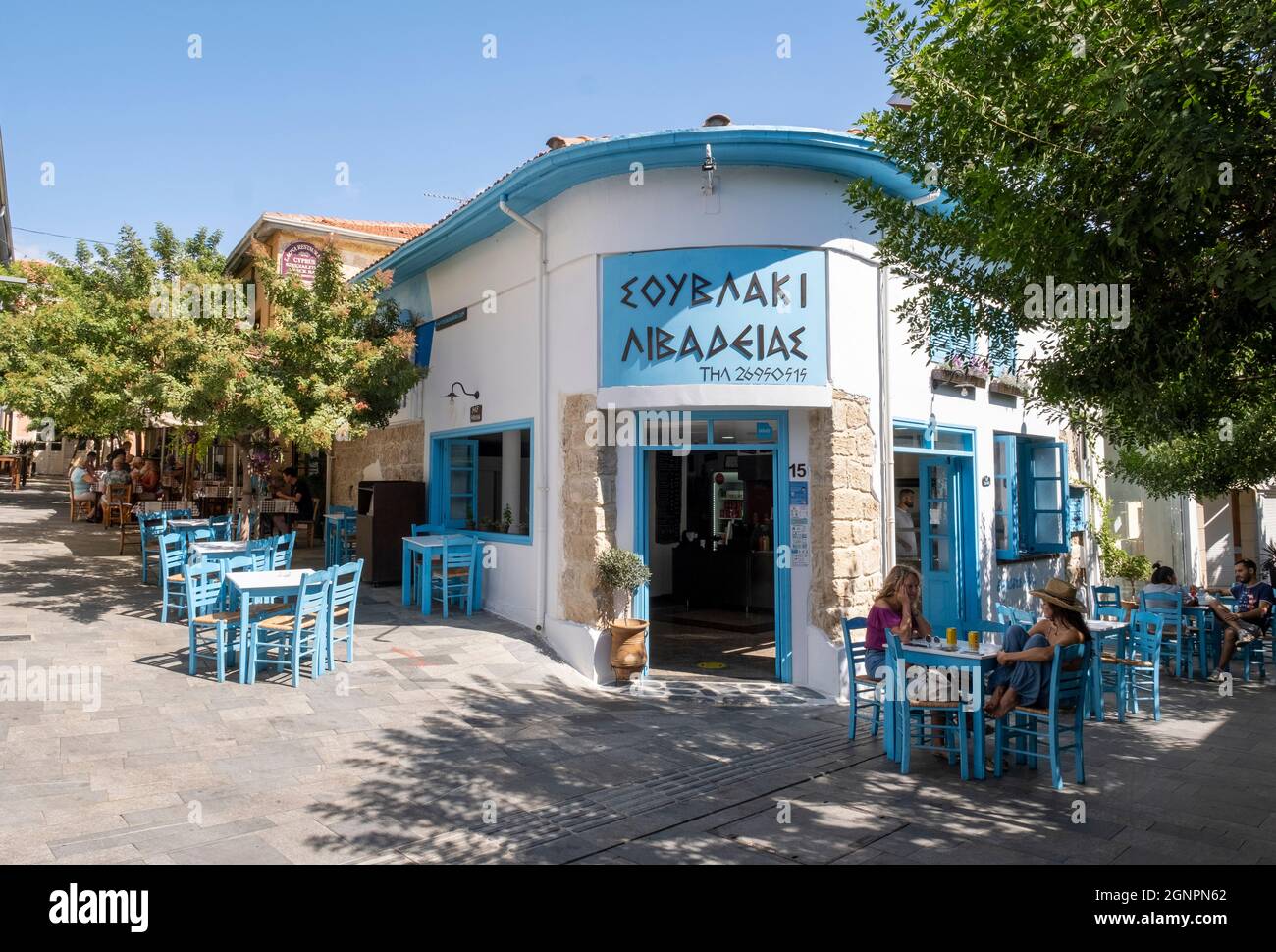 Traditional cafe with outside tables in Paphos old town centre, paphos