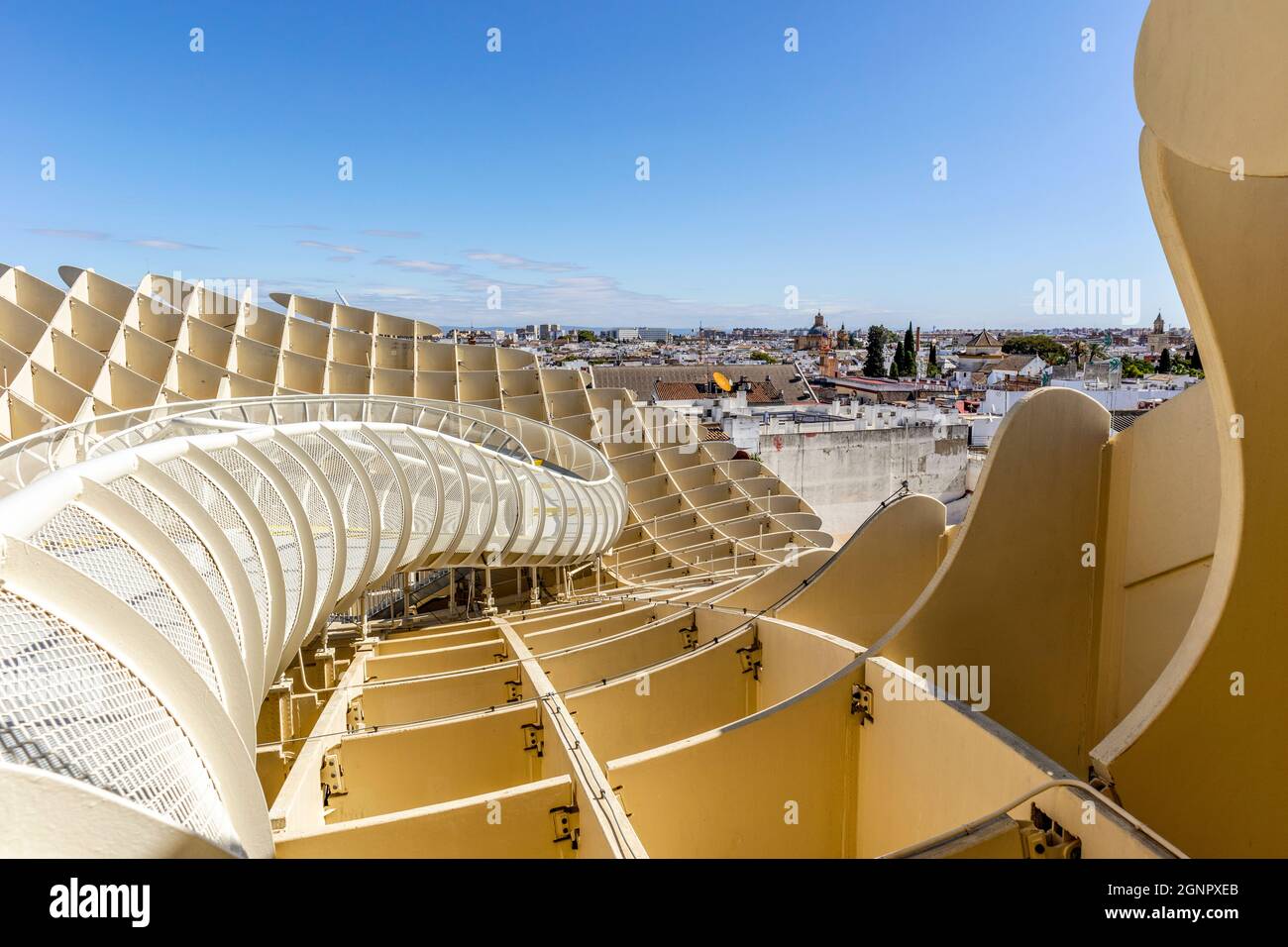 Seville skyline with wooden roof with walkways called Setas de Sevilla in the foreground, Andalusia, Spain Stock Photo
