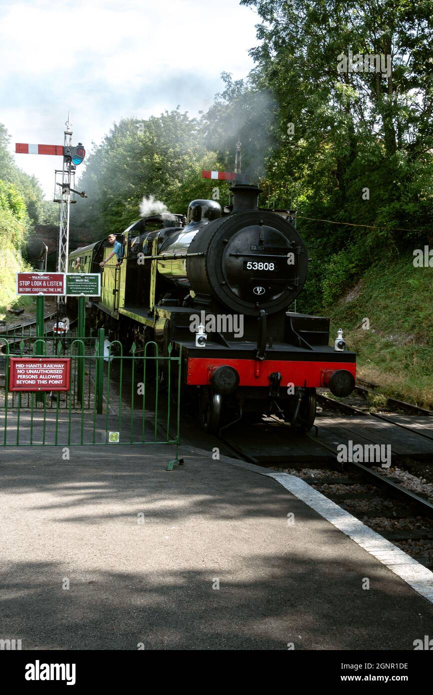 black 5 locomotive arriving at alresford station Watercress Line Hampshire England UK Stock Photo