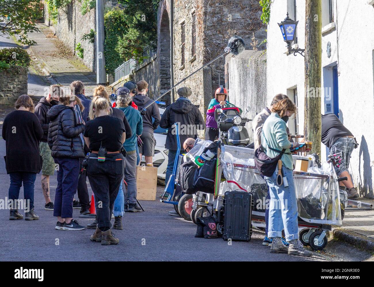 Film crew filming a scene on Irish Street outside Garda Station mock up. Stock Photo