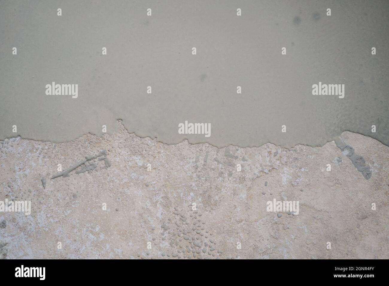 floor partially covering with self-levelling cement mortar Stock Photo