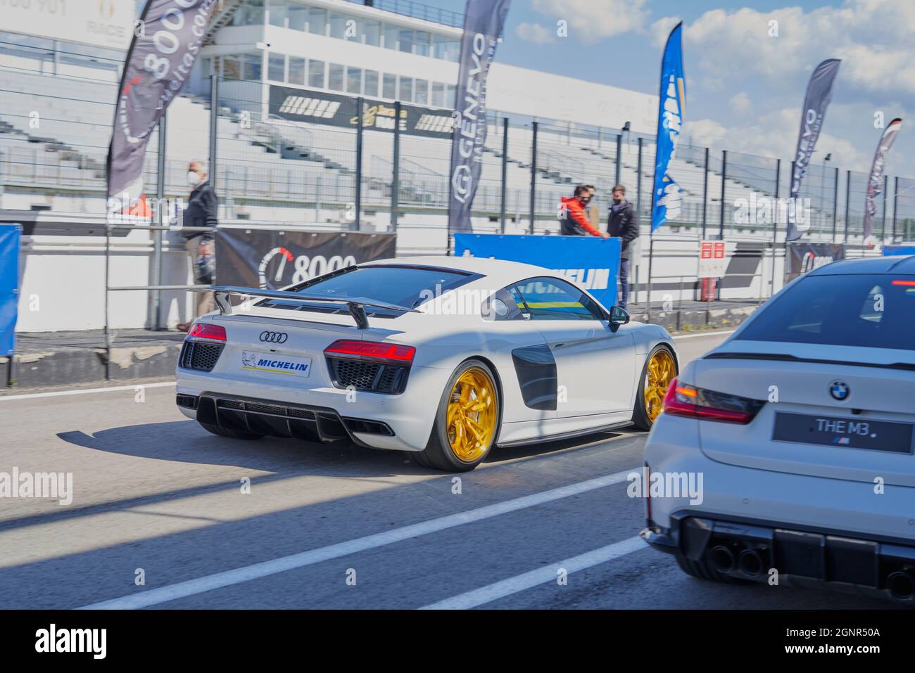 MADRID, SPAIN - Apr 16, 2021: The Audi R8 with gold rims stopped in the ...