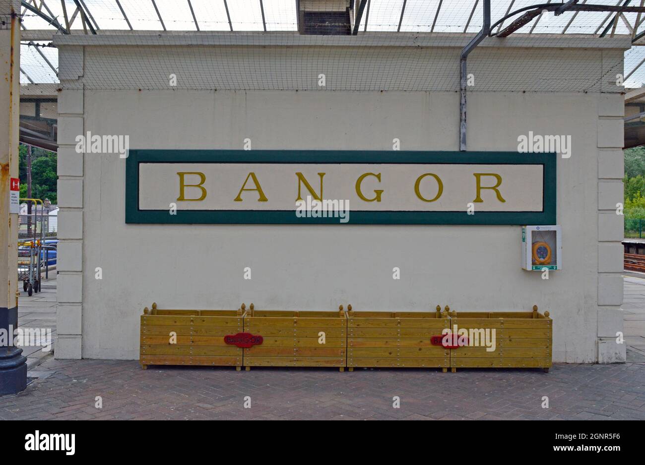 BANGOR, GWYNEDD.WALES. 06-26-21. The railway station, period name plaque on the station buildings. Stock Photo