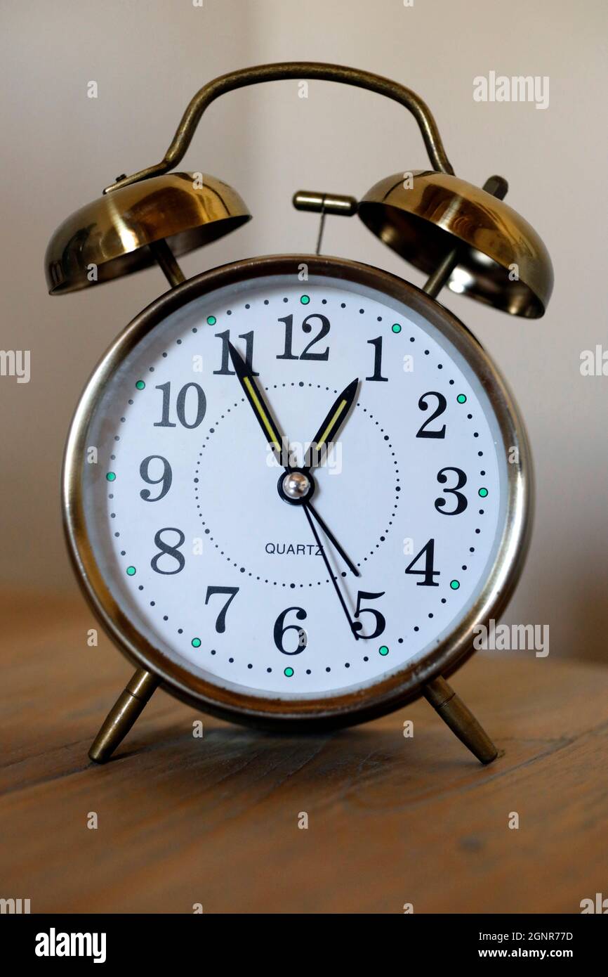 Oldfashioned vintage copper alarm clock. Dubai. United Arab Emirates