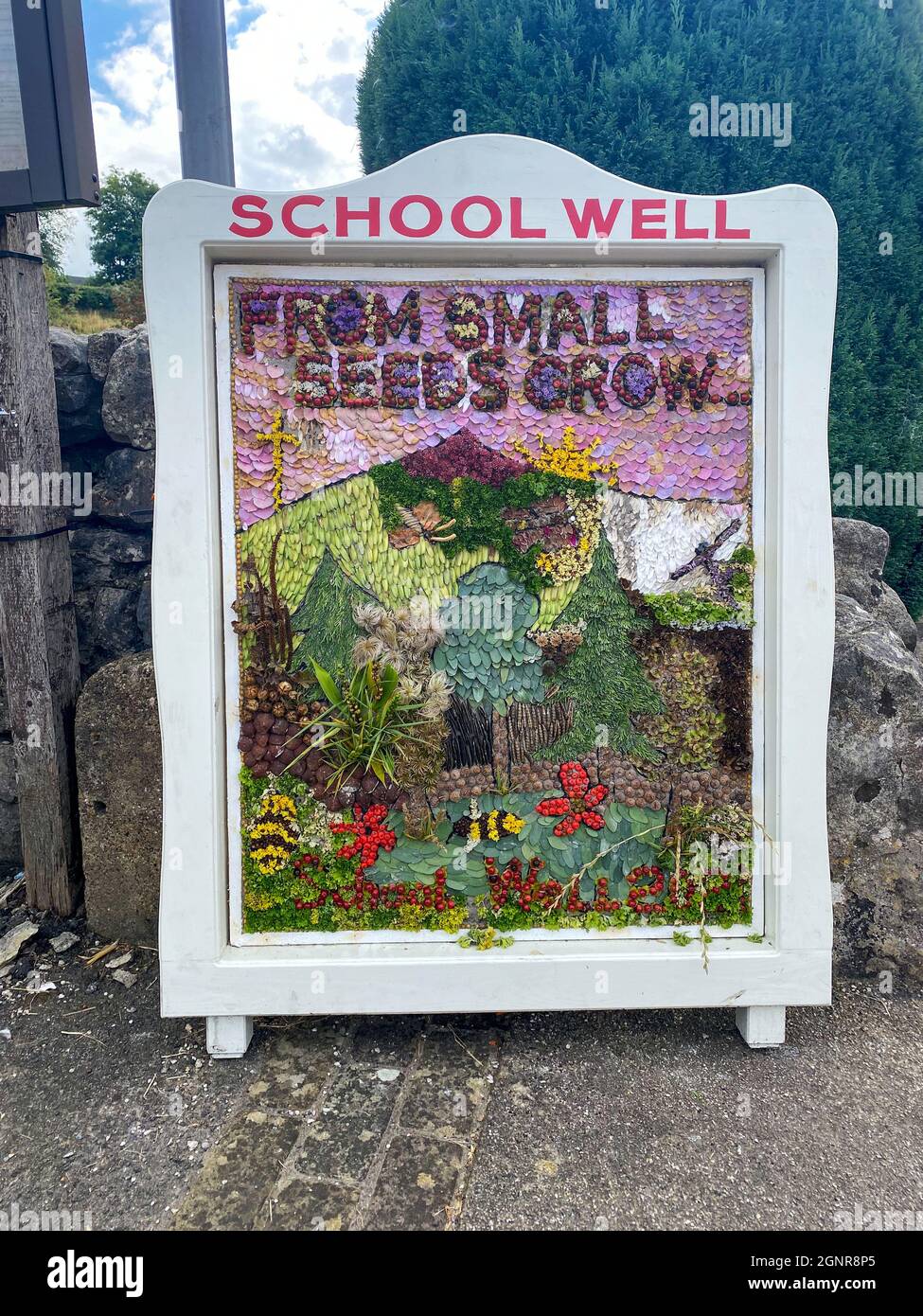 The Well Dressings at Hartington. Well dressing with a floral design is a tradition in many Derbyshire towns and villages Stock Photo